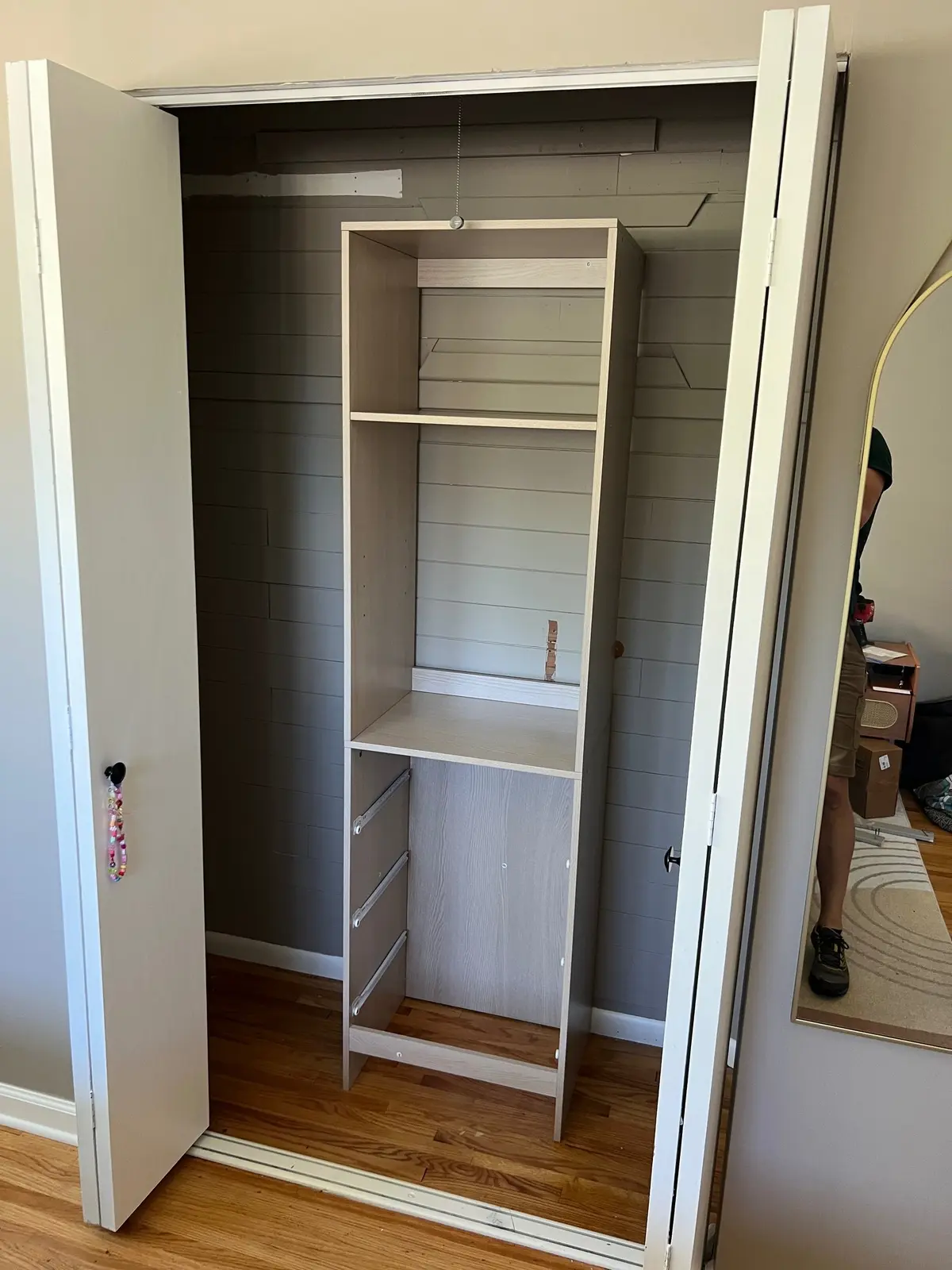 Custom closet organizer during installation